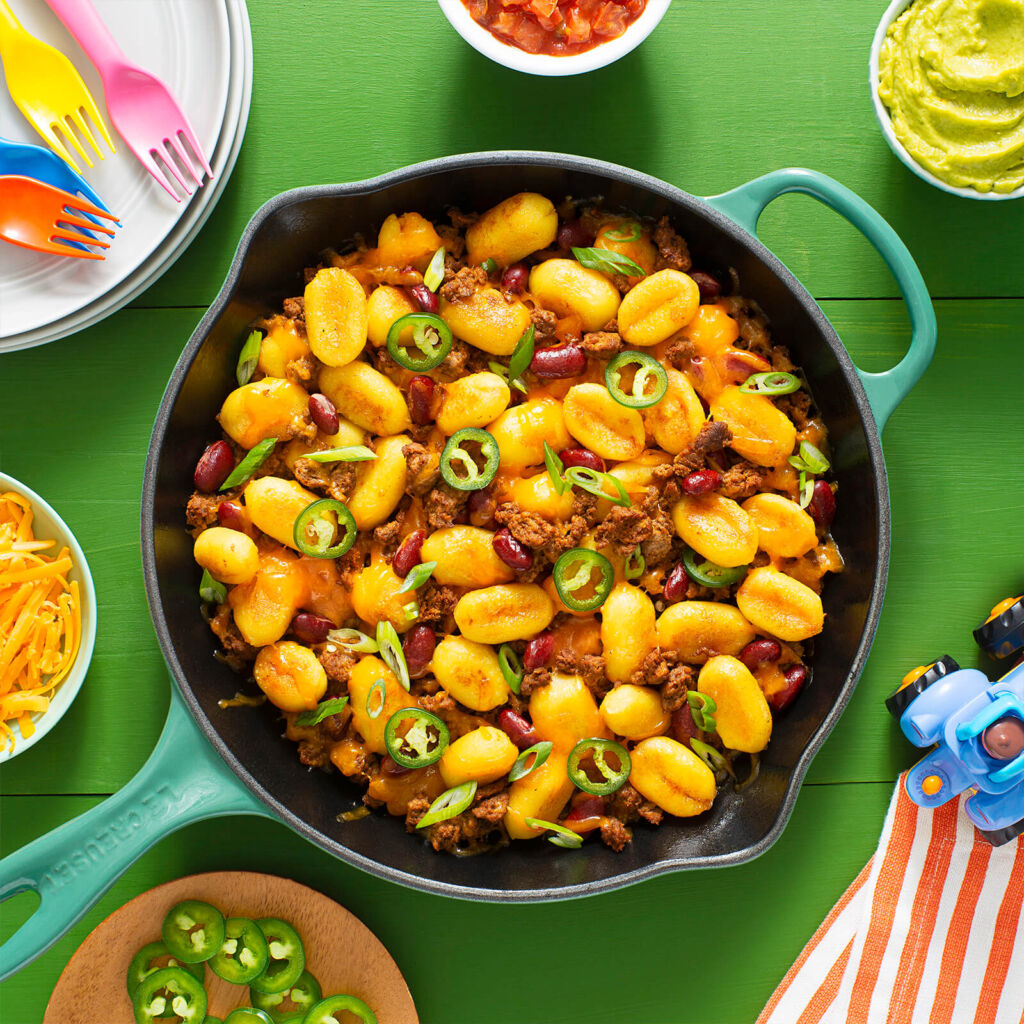 Gnocchi-with-beef-jalapeños-and-beans-mixed-in-a-skillet