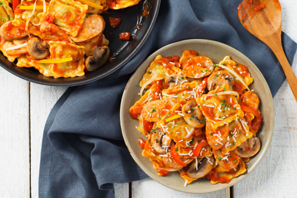 ravioli-with-sausage-peppers-and-mushroom-served-on-a-plate