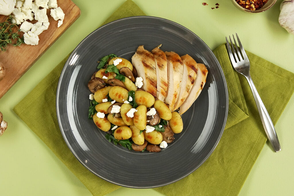 spinach-mushroom-goat-cheeseand-chicken-with-gnocchi-on-a-plate