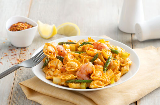 tortellini-with-asparagus-and-shrimp-served-on-a-plate
